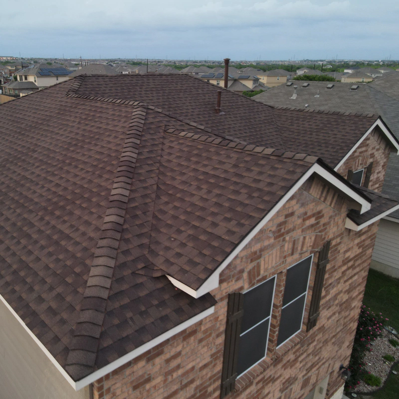 newly installed roof shingles mcqueeney tx